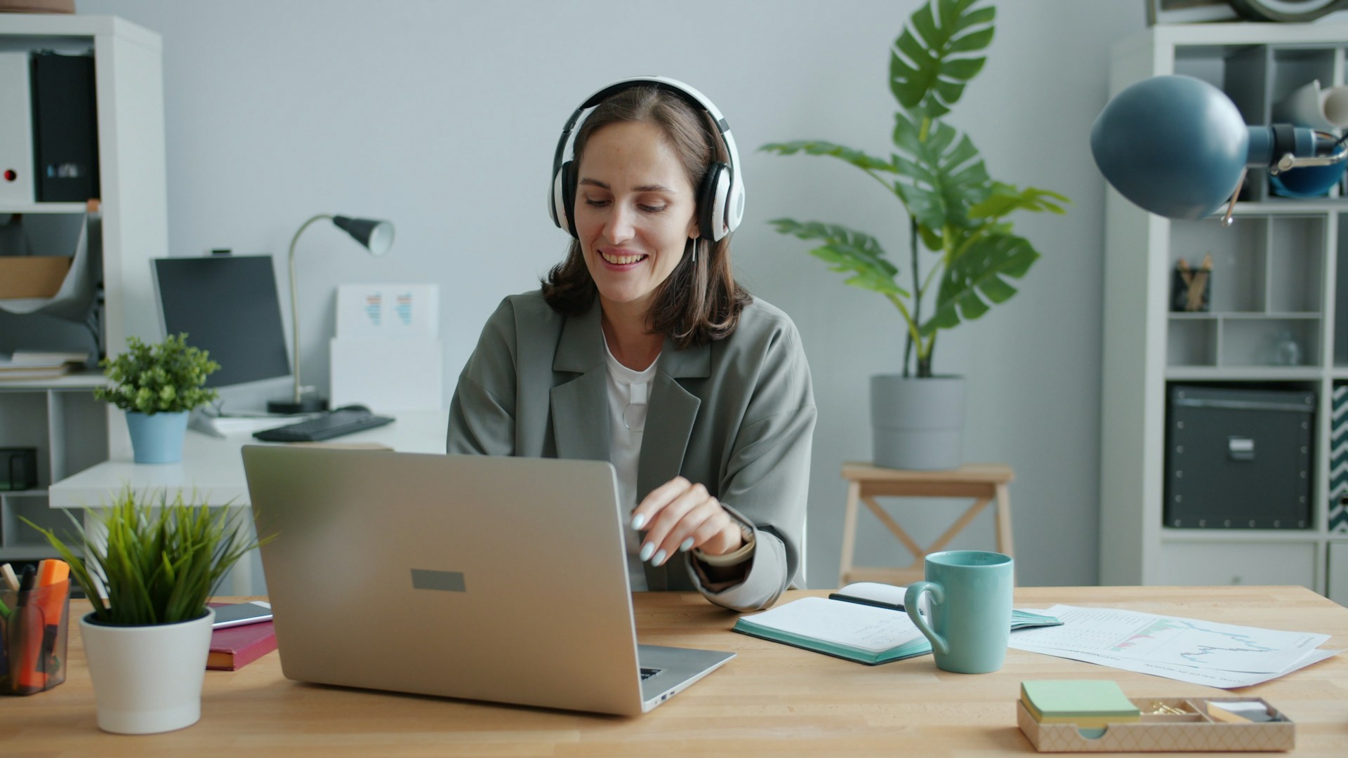 woman smiling while using laptop woman smiling while using laptop